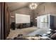The home theater features a large screen, speaker system, and comfortable seating at 538 Mulberry Fern Dr, Auburn, GA 30011