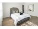 Bedroom with a luxurious bed, modern decor, and lots of natural light at 833 Humphries Sw St, Atlanta, GA 30310