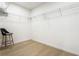 Walk in closet with wood floor and wire shelving at 833 Humphries Sw St, Atlanta, GA 30310