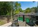 Exterior deck with seating and wooded view at 833 Humphries Sw St, Atlanta, GA 30310