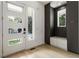 Bright foyer featuring wood floors and modern cabinets with seating at 833 Humphries Sw St, Atlanta, GA 30310
