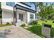 Front porch view showcasing a modern black and white color scheme at 833 Humphries Sw St, Atlanta, GA 30310