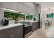 Modern kitchen with a large picture window and stainless steel appliances at 833 Humphries Sw St, Atlanta, GA 30310