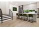 Contemporary kitchen featuring a large island with seating and sleek cabinetry at 833 Humphries Sw St, Atlanta, GA 30310