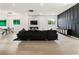 Open-concept layout with living area, dining space, and modern fireplace at 833 Humphries Sw St, Atlanta, GA 30310
