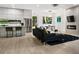 Stylish living area with a modern fireplace, open floor plan, and contemporary design elements at 833 Humphries Sw St, Atlanta, GA 30310