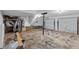 Unfinished basement with a garage door and utilities at 340 Windsor Se Walk, Conyers, GA 30094