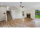 Bright and airy living room with high ceilings, ceiling fan, and stone fireplace at 340 Windsor Se Walk, Conyers, GA 30094