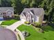 Aerial view of a brick home showing a well-maintained lawn and cul-de-sac at 1343 Cartwright Ln, Lawrenceville, GA 30045