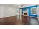 Spacious living room features hardwood floors and a fireplace for a cozy feel at 1343 Cartwright Ln, Lawrenceville, GA 30045