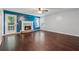 Spacious living room with hardwood floors, fireplace, and abundant natural light at 1343 Cartwright Ln, Lawrenceville, GA 30045