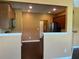 A kitchen view showing stainless steel appliances and dark brown countertops with wooden cabinets at 1854 Caswell # 56, Marietta, GA 30060