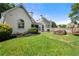 A private backyard with a patio, a screened porch, and well-maintained landscaping, perfect for outdoor living at 1805 Wilkenson Xing, Marietta, GA 30066