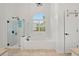 Bright bathroom with a separate shower and soaking tub with tile surround at 1805 Wilkenson Xing, Marietta, GA 30066
