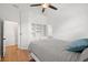 Bedroom with hardwood floors, built in storage and a ceiling fan at 1805 Wilkenson Xing, Marietta, GA 30066