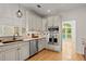 Well-appointed kitchen with stainless steel appliances, custom cabinetry, and ample counter space at 1805 Wilkenson Xing, Marietta, GA 30066