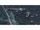 Aerial view of property highlighting the vast lot size and wooded surroundings at 7460 Highway 101, Rockmart, GA 30153