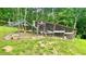 A custom chicken coop is in the backyard at 7460 Highway 101, Rockmart, GA 30153