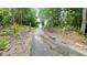 Private driveway leading to a gated entrance, offering seclusion and security at 7460 Highway 101, Rockmart, GA 30153