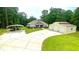 Charming single-story home with detached garage and spacious driveway at 7460 Highway 101, Rockmart, GA 30153