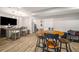 Finished basement featuring a bar, tv, and seating area with modern flooring at 1024 Brownstone Dr # 2, Marietta, GA 30008