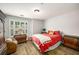 Comfortable bedroom featuring a bed, window and dressers at 1024 Brownstone Dr # 2, Marietta, GA 30008