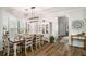 Dining area with a dark wood table, seating for six, and ample natural light at 1024 Brownstone Dr # 2, Marietta, GA 30008