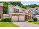 Charming two-story home featuring a stone facade and a two-car garage at 1024 Brownstone Dr # 2, Marietta, GA 30008
