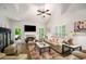 Bright living room featuring a fireplace, vaulted ceilings, and access to the outdoor area at 1024 Brownstone Dr # 2, Marietta, GA 30008