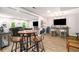 Open-concept living space features a bar area, a round table and a seating section at 1024 Brownstone Dr # 2, Marietta, GA 30008