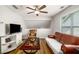Bright, comfortable living room with hardwood floors and a cozy leather sofa at 1024 Brownstone Dr # 2, Marietta, GA 30008