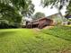Expansive backyard featuring a large deck and mature trees at 25 Gladstone Sw Dr, Marietta, GA 30060