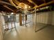 Spacious unfinished basement with exposed ductwork and painted concrete floor at 25 Gladstone Sw Dr, Marietta, GA 30060