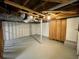 Unfinished basement with visible ceiling and painted floor at 25 Gladstone Sw Dr, Marietta, GA 30060
