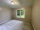 Neutral bedroom with carpet and single window at 25 Gladstone Sw Dr, Marietta, GA 30060