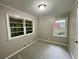 Cozy bedroom with neutral colors, two windows, and plush carpeting at 25 Gladstone Sw Dr, Marietta, GA 30060