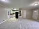 Cozy living room flowing into a well-equipped kitchen with tiled floor at 25 Gladstone Sw Dr, Marietta, GA 30060