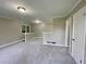 Bright living room with fresh carpet and neutral paint at 25 Gladstone Sw Dr, Marietta, GA 30060