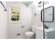 Bathroom with a stylish vanity, black hardware and an elegant mirror at 504 Milligan Dr, Stone Mountain, GA 30083