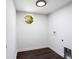 The laundry room features dark floors and a unique window providing natural light at 504 Milligan Dr, Stone Mountain, GA 30083