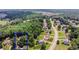 Aerial view of the neighborhood and home at 2373 Oak Falls Lane in Buford, GA near community amenities at 2373 Oak Falls Ln, Buford, GA 30519