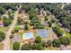 Aerial view of neighborhood amenities, including a pool, tennis courts, and a basketball court at 2373 Oak Falls Ln, Buford, GA 30519