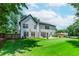 Expansive backyard with well-maintained lawn and patio, offering plenty of space for outdoor living at 2373 Oak Falls Ln, Buford, GA 30519