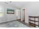 Bright bedroom with wood-style floors and neutral wall at 2373 Oak Falls Ln, Buford, GA 30519