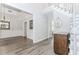 Spacious foyer boasts neutral tones, hardwood floors, and staircase leading to the upper level at 2373 Oak Falls Ln, Buford, GA 30519