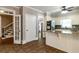 Eat-in kitchen featuring granite counters, stainless appliances, and white cabinetry at 349 Harris Loop, Dallas, GA 30157