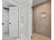 Updated bathroom features an enclosed glass shower with built-in bench at 4004 Charrwood Trce, Marietta, GA 30062