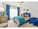 Inviting bedroom with a tufted headboard, stylish decor, and plenty of natural light at 625 St Annes Pl, Covington, GA 30016