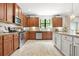 Kitchen featuring granite countertops, stainless steel appliances and modern cabinets at 625 St Annes Pl, Covington, GA 30016