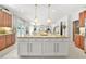 Open concept kitchen with granite island, stainless steel appliances and breakfast area at 625 St Annes Pl, Covington, GA 30016